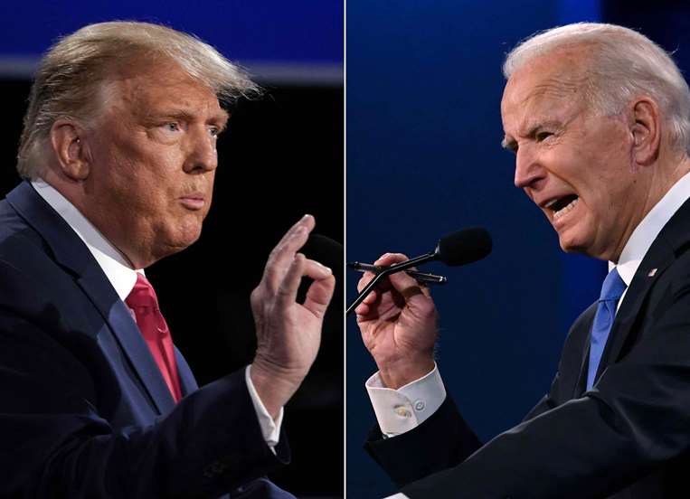 Donald Trump y Joe Biden en el debate presidencial en la Universidad Belmont en 2020 / AFP